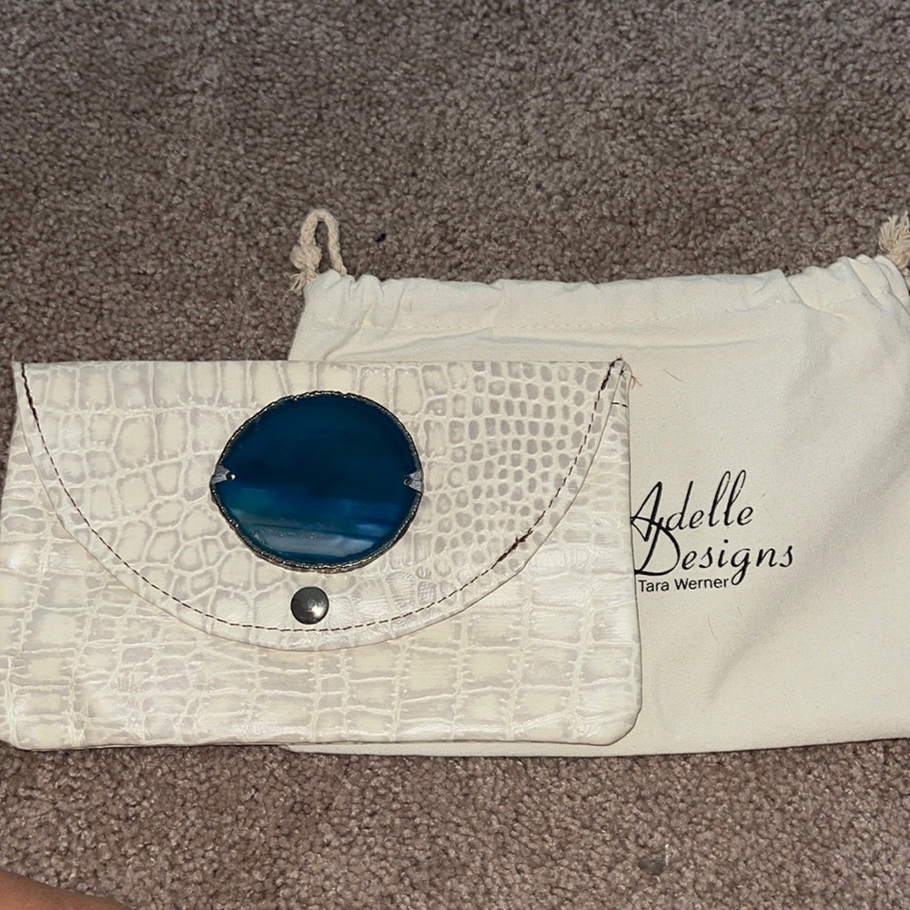 Adele Designs white clutch with blue stone
